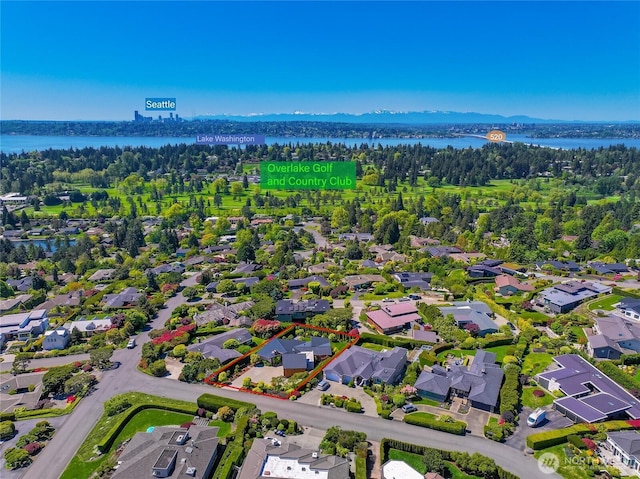 aerial view with a water view and a residential view