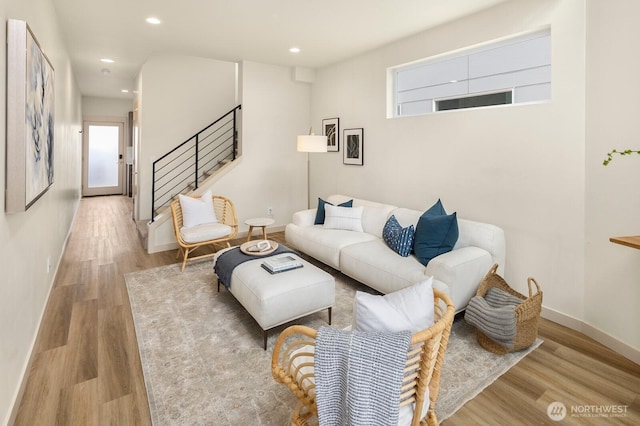 2612A SW Nevada St, Seattle, WA 98126 - living area featuring stairs, wood finished floors, plenty of natural light, recessed lighting, and baseboards