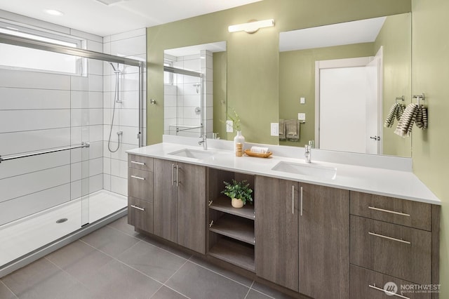2612A SW Nevada St, Seattle, WA 98126 - bathroom featuring a shower stall, double vanity, and tile patterned flooring