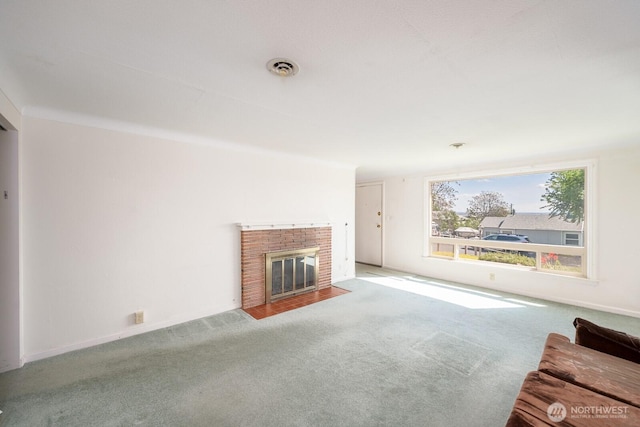 unfurnished living room featuring carpet, a brick fireplace, and visible vents