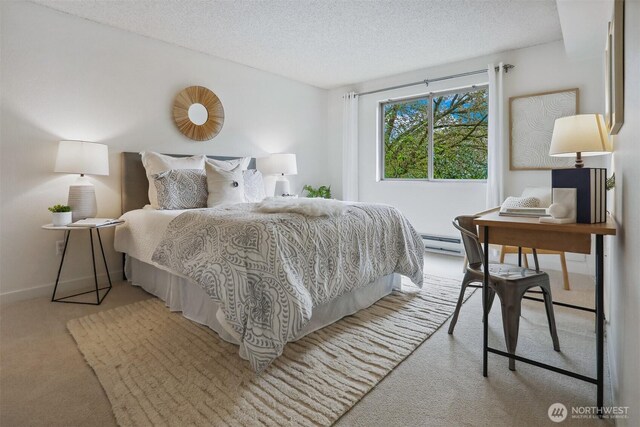 275 W Roy St Unit 216, Seattle, WA 98119 - bedroom featuring a textured ceiling, light colored carpet, baseboards, and a baseboard radiator