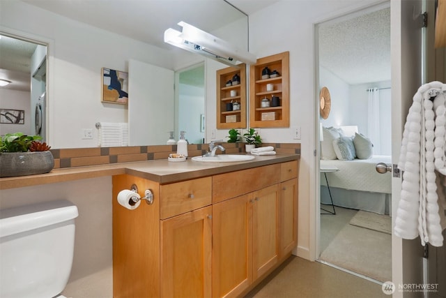 275 W Roy St Unit 216, Seattle, WA 98119 - ensuite bathroom with connected bathroom, toilet, and vanity