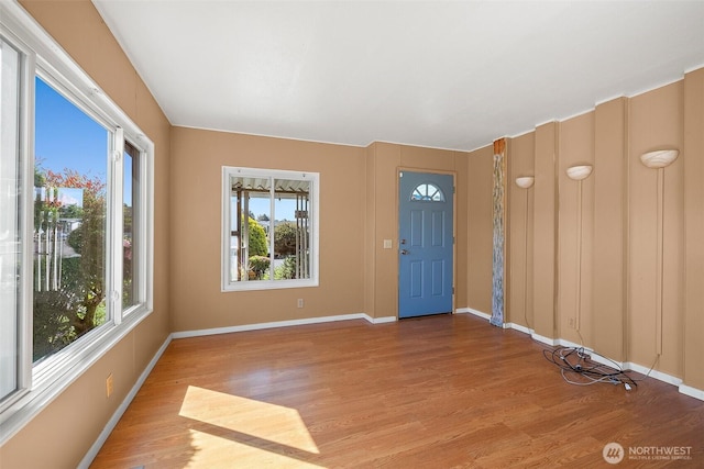 1402 22nd St NE Unit 65, Auburn, WA 98002 - entrance foyer featuring light wood finished floors and baseboards