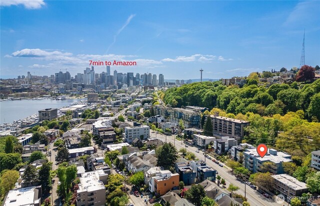 birds eye view of property with a view of city