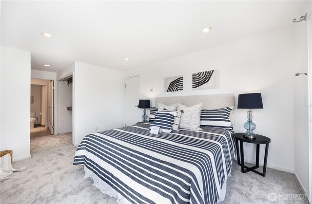 carpeted bedroom featuring recessed lighting and baseboards