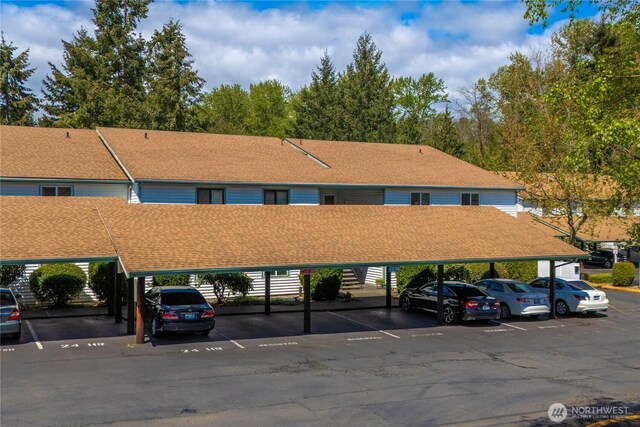 view of property with covered parking