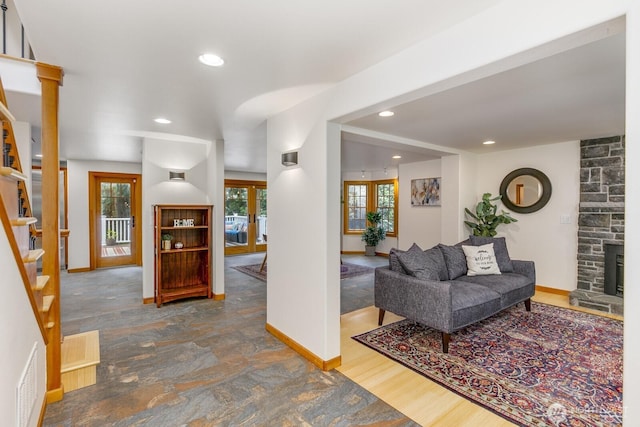 entryway with stairway, baseboards, french doors, and recessed lighting