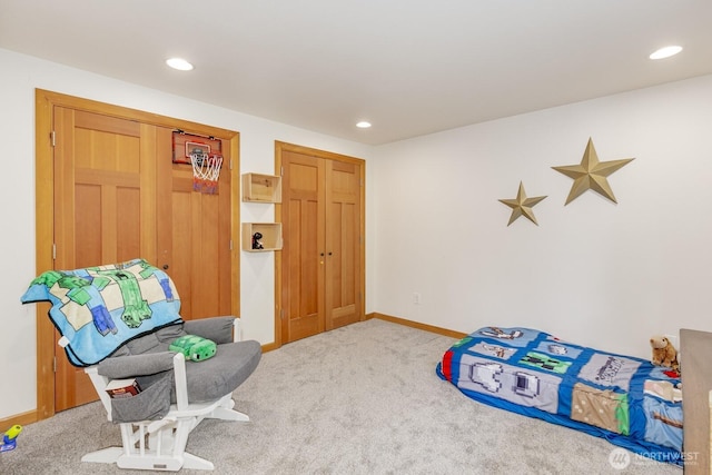 carpeted bedroom with recessed lighting and baseboards