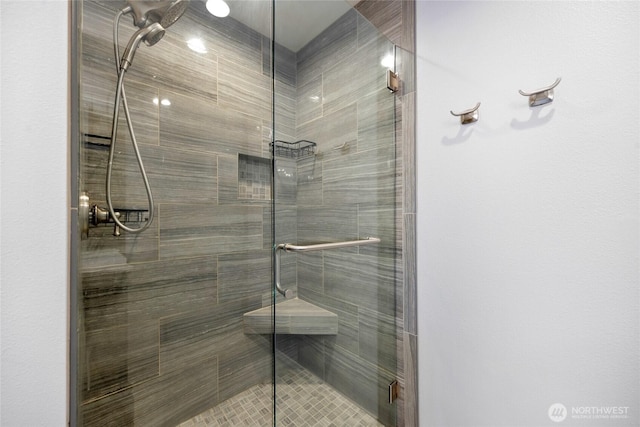full bathroom featuring a stall shower