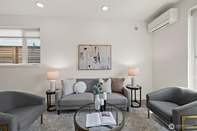 2414 NW 64th St Unit A, Seattle, WA 98107 - living room featuring a wall mounted AC, recessed lighting, and baseboards