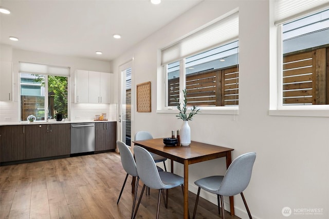 2414 NW 64th St Unit A, Seattle, WA 98107 - dining area featuring plenty of natural light, light wood-style flooring, and recessed lighting