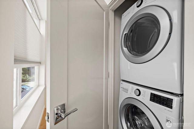 2414 NW 64th St Unit A, Seattle, WA 98107 - laundry area featuring stacked washer / dryer
