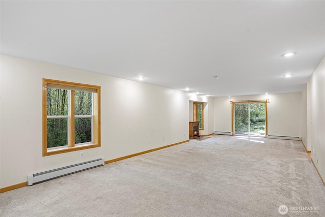 15845 118th Ln SE, Yelm, WA 98597 - carpeted spare room with recessed lighting, baseboards, and a baseboard heating unit