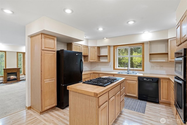 15845 118th Ln SE, Yelm, WA 98597 - kitchen featuring a sink, light brown cabinets, open shelves, and black appliances