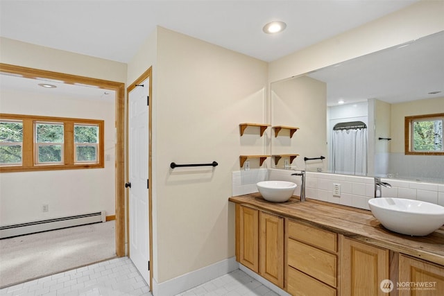15845 118th Ln SE, Yelm, WA 98597 - full bathroom featuring double vanity, a sink, a baseboard radiator, and recessed lighting