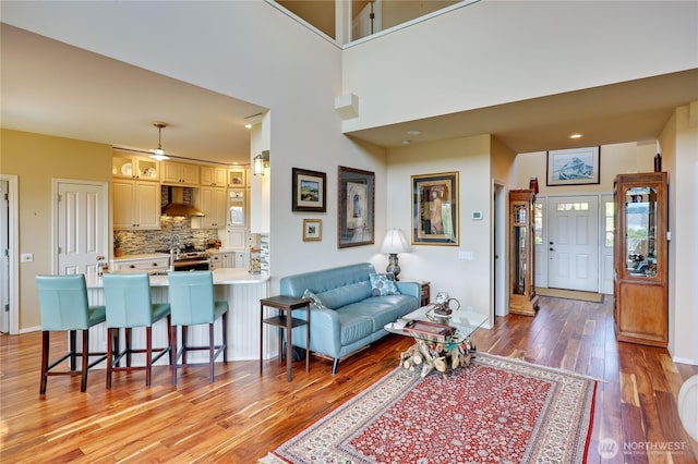 1664 Shine Rd, Port Ludlow, WA 98365 - living room with light wood-style floors and baseboards