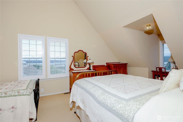 1664 Shine Rd, Port Ludlow, WA 98365 - bedroom featuring light carpet, lofted ceiling, and baseboards