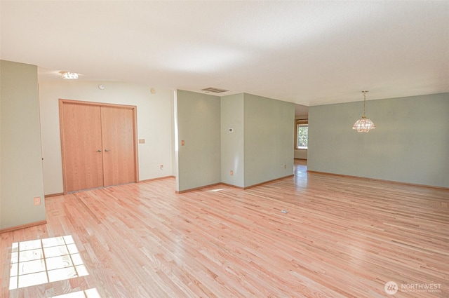 4310 Brookdale Rd E, Tacoma, WA 98446 - unfurnished room featuring light wood finished floors and baseboards