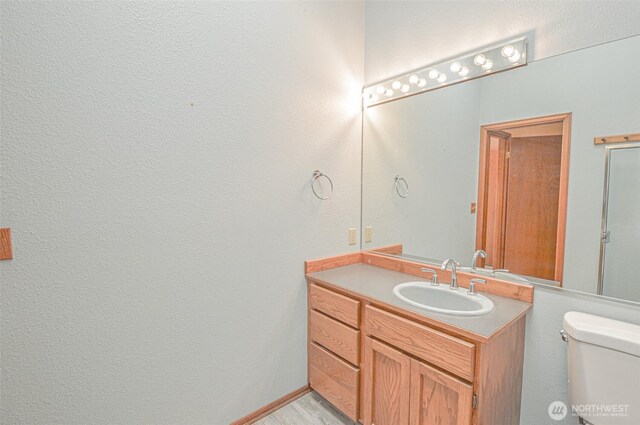 4310 Brookdale Rd E, Tacoma, WA 98446 - bathroom featuring vanity and toilet