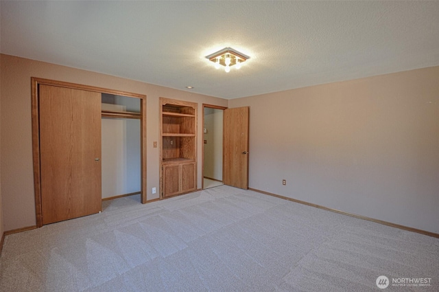 4310 Brookdale Rd E, Tacoma, WA 98446 - unfurnished bedroom featuring light carpet, a closet, and baseboards