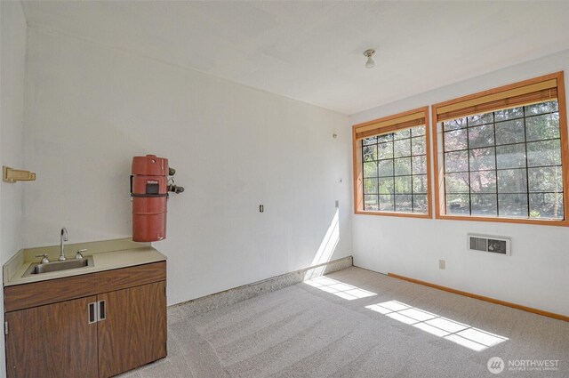 4310 Brookdale Rd E, Tacoma, WA 98446 - spare room with a sink, light colored carpet, and baseboards