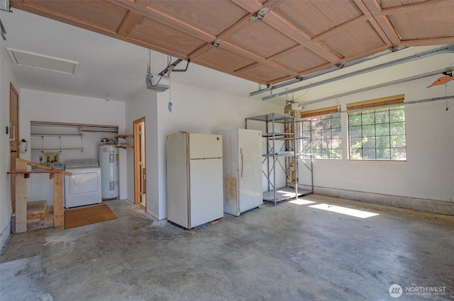 4310 Brookdale Rd E, Tacoma, WA 98446 - garage featuring freestanding refrigerator, washer / clothes dryer, electric water heater, and a garage door opener
