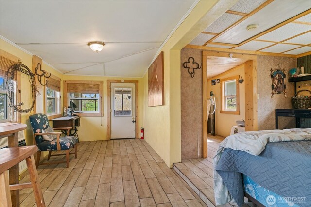 interior space featuring light wood-style floors and multiple windows
