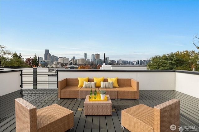 wooden deck featuring an outdoor living space and a city view