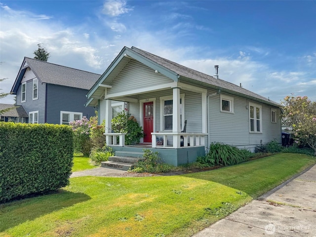 view of front facade with a porch and a front yard