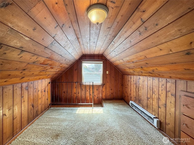 additional living space with baseboard heating, wooden ceiling, wooden walls, lofted ceiling, and carpet flooring