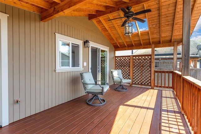 wooden deck with a ceiling fan