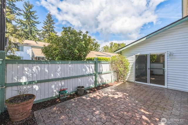 view of patio with fence