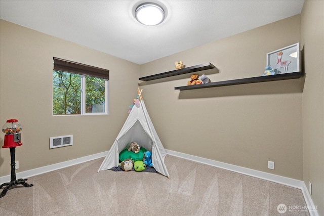 19542 6th Ave NE, Shoreline, WA 98155 - recreation room with visible vents, baseboards, and carpet floors