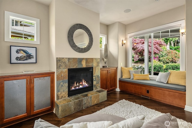 24270 SE 147th Pl, Issaquah, WA 98027 - sitting room featuring a tiled fireplace, dark wood finished floors, and baseboards