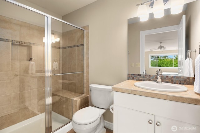 24270 SE 147th Pl, Issaquah, WA 98027 - full bath with a shower stall, vanity, toilet, and a ceiling fan