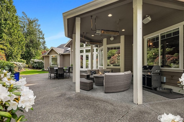 24270 SE 147th Pl, Issaquah, WA 98027 - view of patio / terrace featuring an outdoor living space with a fire pit, area for grilling, and outdoor dining area
