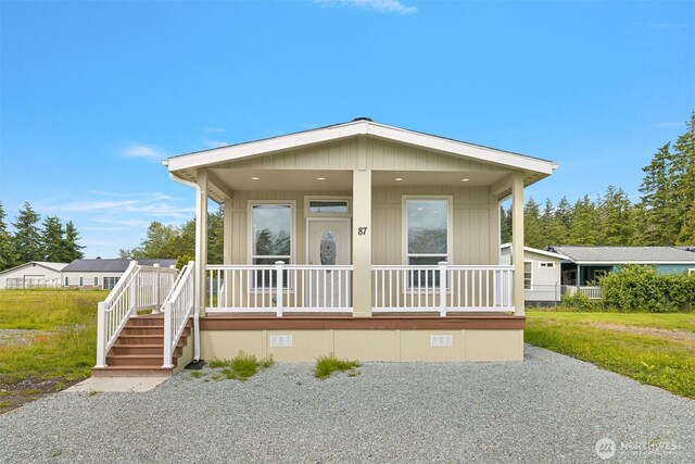4672 Birch Bay Lynden Rd Unit 87, Blaine, WA 98230 - manufactured / mobile home featuring covered porch and crawl space