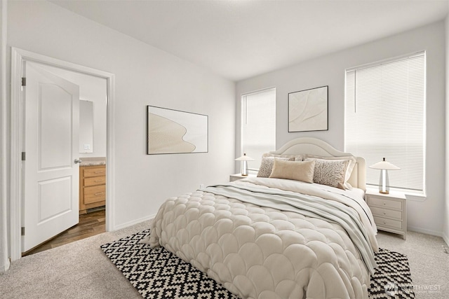 4672 Birch Bay Lynden Rd Unit 87, Blaine, WA 98230 - bedroom with light carpet, baseboards, and ensuite bathroom