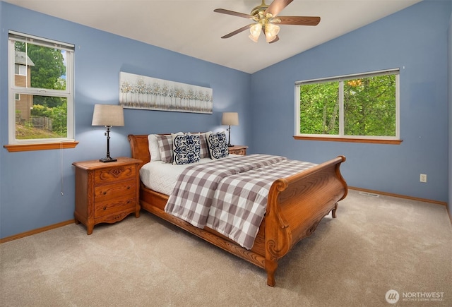 27627 NE 140th Pl, Duvall, WA 98019 - carpeted bedroom with baseboards, ceiling fan, and lofted ceiling