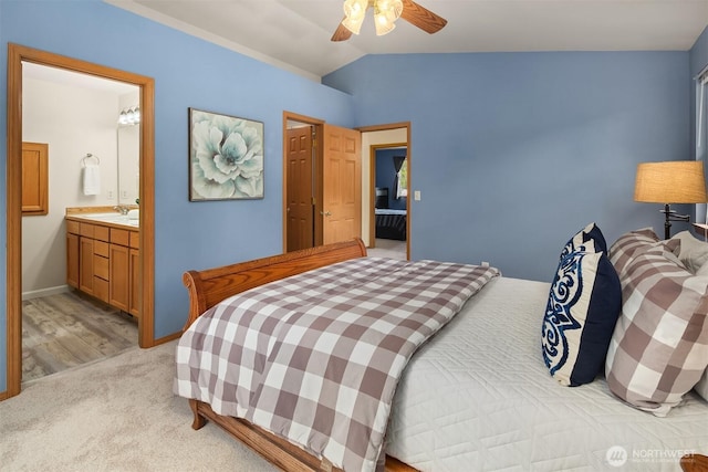 27627 NE 140th Pl, Duvall, WA 98019 - bedroom featuring light carpet, a sink, a ceiling fan, baseboards, and vaulted ceiling