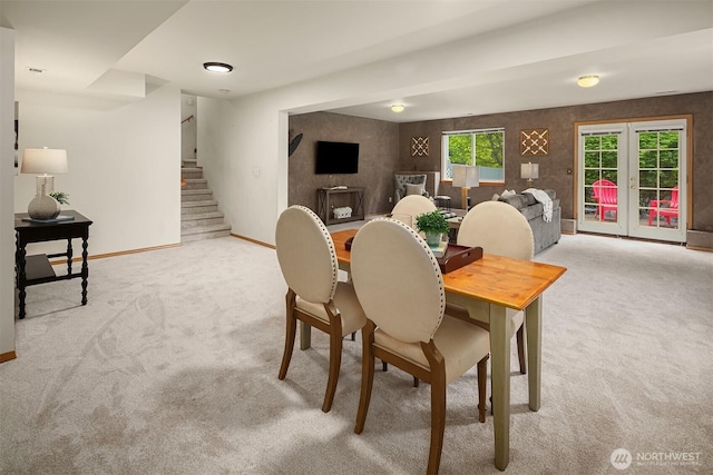 27627 NE 140th Pl, Duvall, WA 98019 - dining area featuring carpet floors, baseboards, and stairs