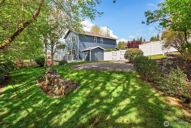 27627 NE 140th Pl, Duvall, WA 98019 - view of yard featuring a fenced backyard and a wooden deck