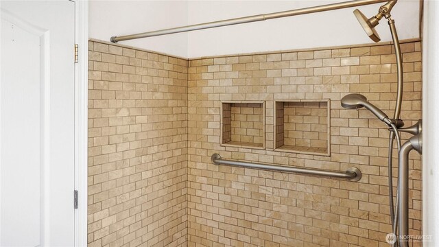 full bathroom with a shower stall