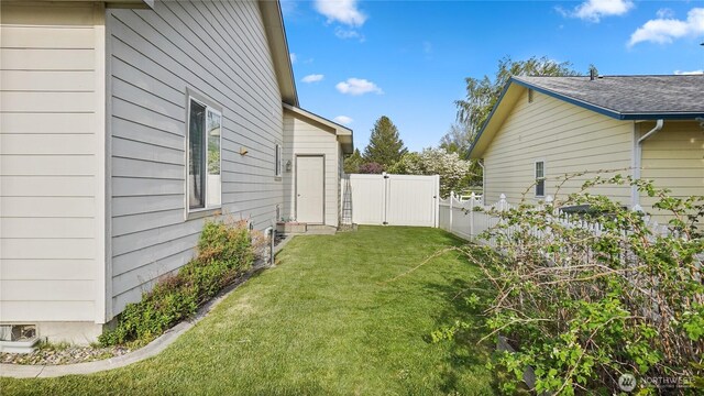 view of yard featuring fence