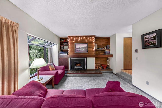 carpeted living area with a textured ceiling