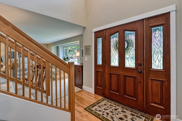 3506 S Grace Ln, Bellingham, WA 98226 - entryway featuring baseboards, light wood-style floors, and stairway