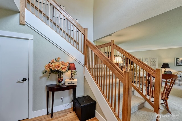 3506 S Grace Ln, Bellingham, WA 98226 - stairs with baseboards and wood finished floors