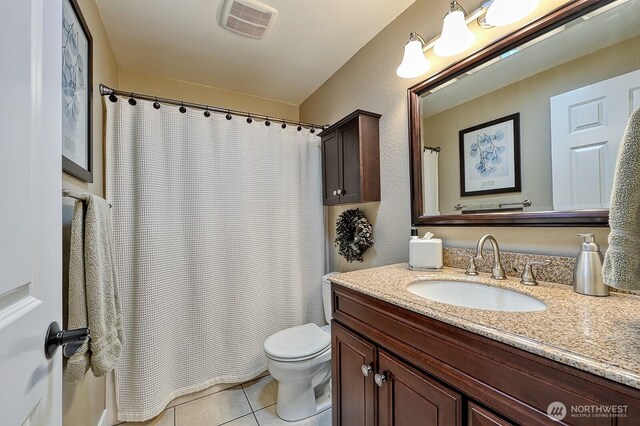 3506 S Grace Ln, Bellingham, WA 98226 - full bath with toilet, visible vents, curtained shower, tile patterned flooring, and vanity