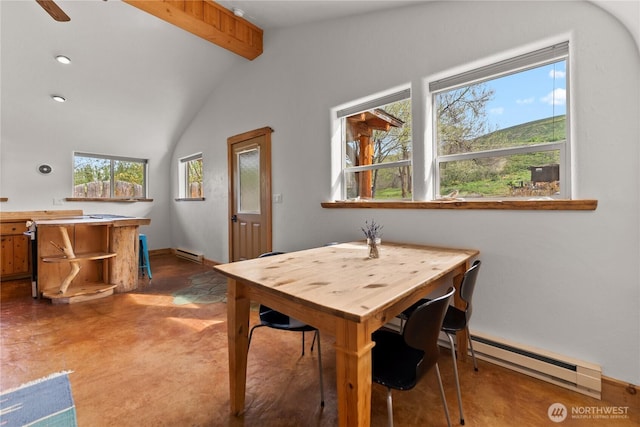 811 Filer Ave, Winthrop, WA 98862 - dining space featuring vaulted ceiling with beams, baseboards, and baseboard heating
