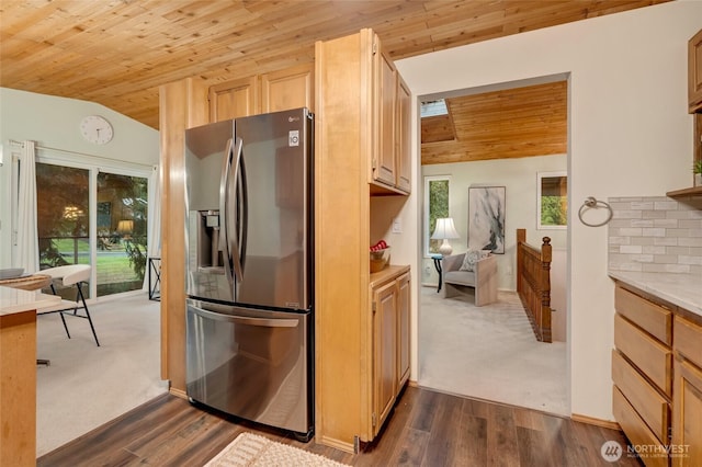 kitchen featuring stainless steel fridge with ice dispenser, wood ceiling, dark carpet, and lofted ceiling